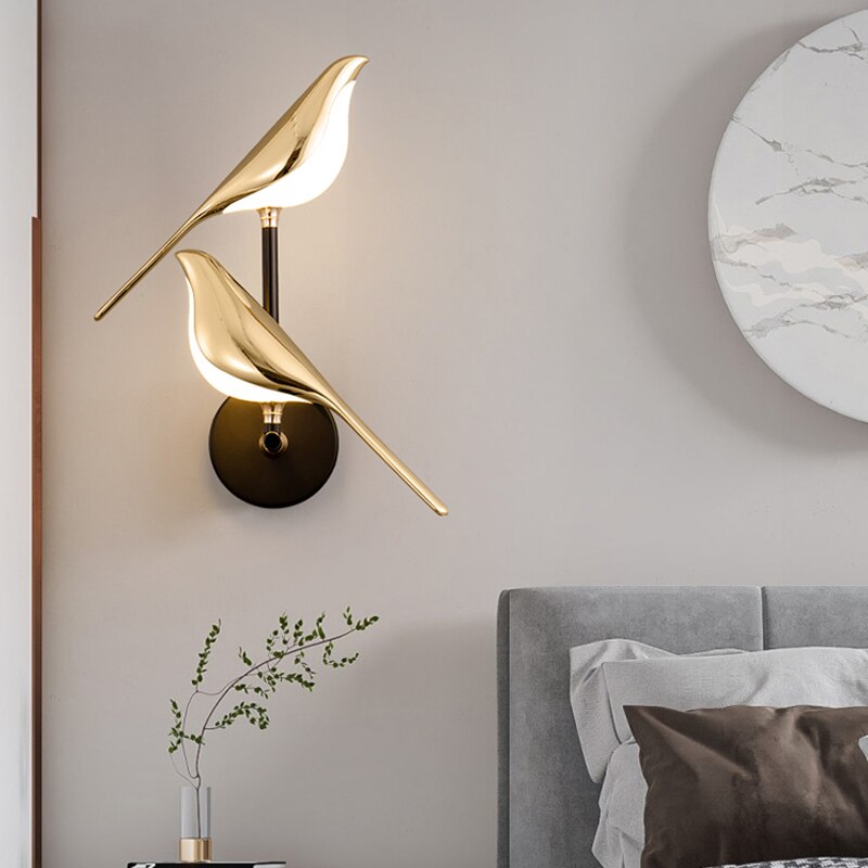 BirdLight - Stijlvolle vogelvormige wandlamp met gouden design